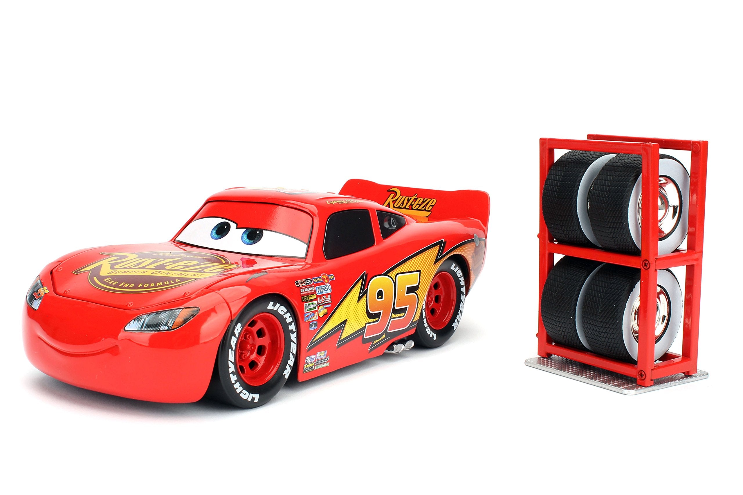 Disney Pixar Cars 3 1:24 Lightning Mcqueen Coche Fundido a presión con Estante para neumáticos (99751)